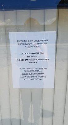 An announcement posted outside their store.