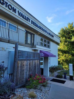 Entrance at side of building, on first floor