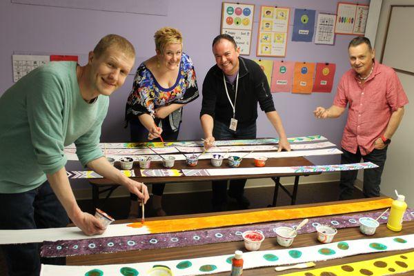 Spectrum instructors having fun painting at our clinic facility in Pittsford, NY.