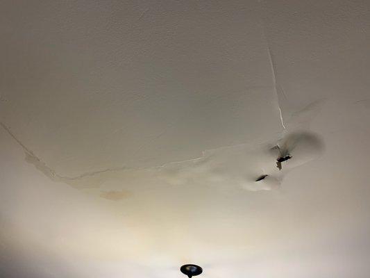 Ruined ceiling due to water left dripping