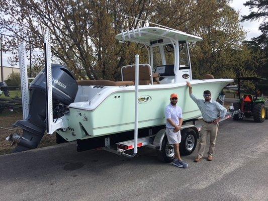 The Barrineau's picking up their new Sea Hunt U255 with twin power poles and Yamaha F300!