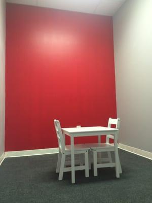 Our red therapy room!  One of four rooms.