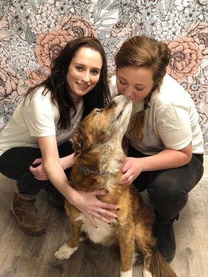 Addie and Abby - the groomers with one of their pups!