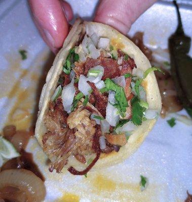 A little too crispy inside this carnitas taco.