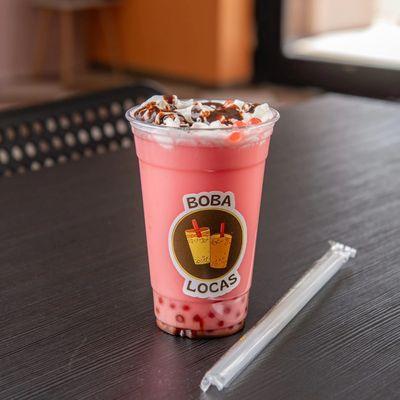 Strawberry bliss 
Blended Strawberry milk tea with Strawberry popping boba and whipped cream