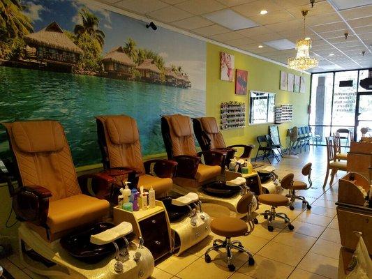 We have new 2016 pedicure chairs, modern chairs with very relaxing massage on chairs and a very beach-theme relaxing environment!