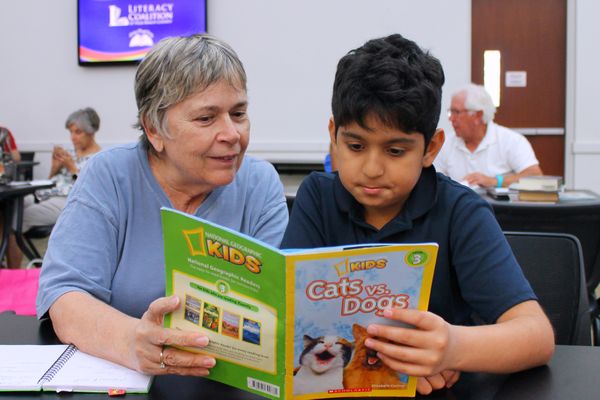 Building Better Readers volunteer tutor with student