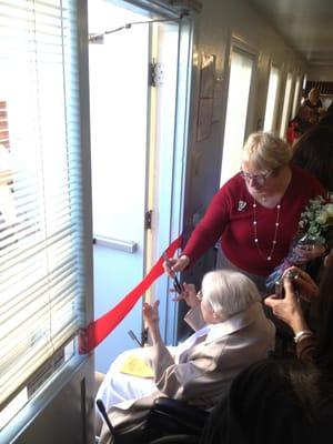 Sister Claire cutting the ribbon during the blessing of the preschool and she's also celebrating her 106th birthday!