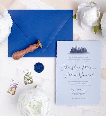 Handmade paper for wedding invitations is always a delicate and elegant idea. Also it's including a custom watercolor painting to the design