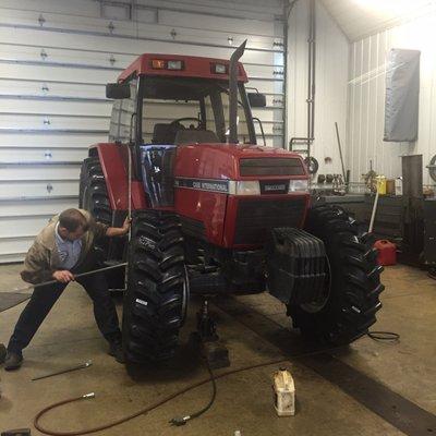 Brian getting this tractor ready spring planting!