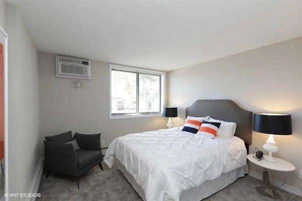 The bedroom in our updated one-bedroom floor plan. Full size closet with double doors and LOTS of space and even a shelf on top!