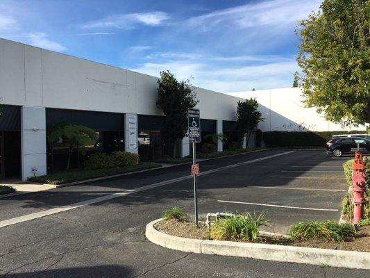 About 10 parking spaces for 5 front commercial units