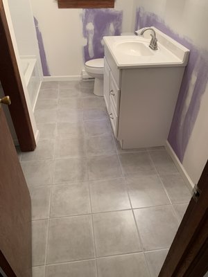 Bathroom Remodel 

12x12 Porcelain Tiles
White Vanity / Sink Top
3x6 Subway Tile Shower 
White Bath Tub