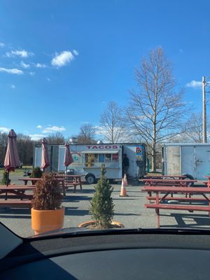 Seating area in front of Rivera Taco Express II.