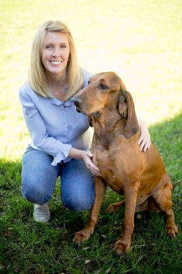 Jake is our 10-yr-old Redbone Coonhound. He is a kind and gentle host. As you can see here, our fenced backyard is grassy.