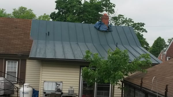 Metal roof Install 30 ft. long panels. We did tear shingle roof off, it looks like we didnt Thats just were we stopped that day.