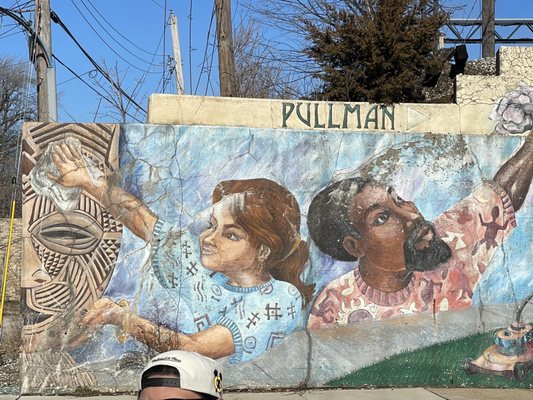 Pullman, noted as being to the east of where this mural is.