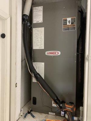 The new air handler installed, at the drain line I installed a float switch to prevent water leaks and damage to the surrounding area.