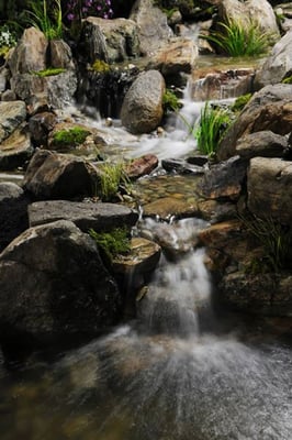 Expert waterfall rock-work can create the most incredible sights and sounds and transform any regular pond into a unique oasis.