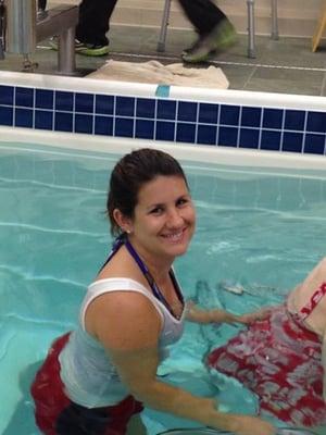 Occupational Therapist With Patient in Pool