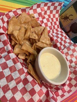 Home made tortilla chips and queso blanco