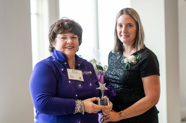 President Joanne MacInnis RN, and Nicole Geddes, LPN Case Manager, winner of the Home Care Alliance of MA 2019 Clinician of the Year Award