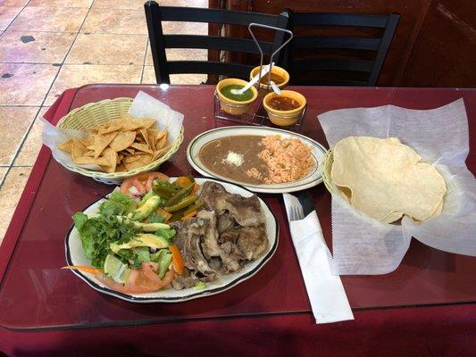 Fresh chivo w rice and  beans, and fresh homemade tortilla(order of 3)