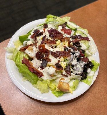 Salad with crisp bacon from the breakfast area