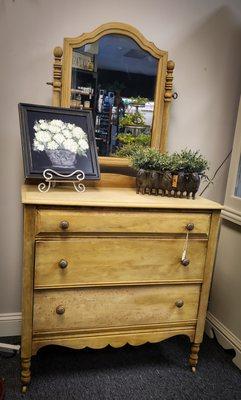 Beautiful vintage dresser striped to natural wood!