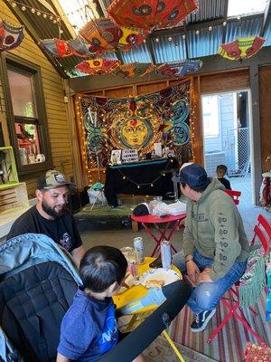 Another shot during TACO TUESDAY! (Two veterans pictured with a child)