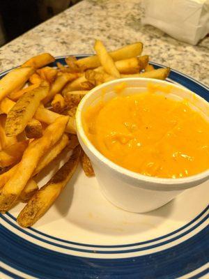 Fries and a "Cup of Cheese" on the side