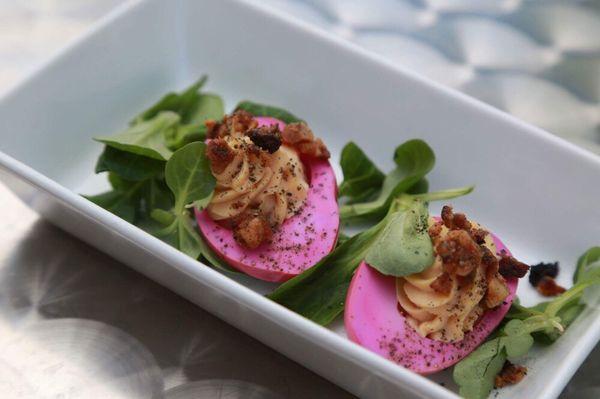 Beet pickled deviled egg, lardons