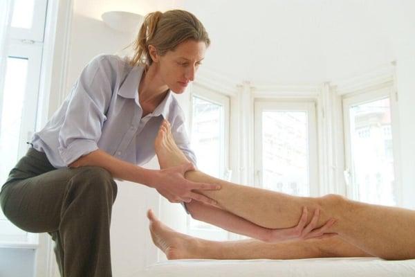 Working with the foot and lower leg in Rolfing SI.