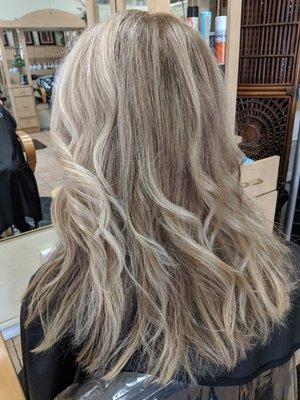 100% grey covered with multi colored roots and baby lights.