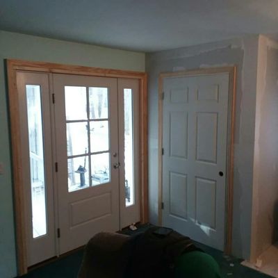 new front door. new framed and trimed coat closest