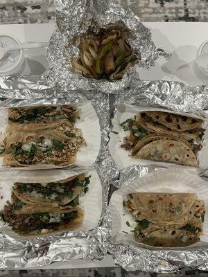 Chicken tacos (top left and bottom right), fajita tacos (bottom left and top right)