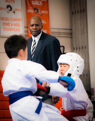 Sensei Alex Ndem judging at the Houston Open Karate Tournament.