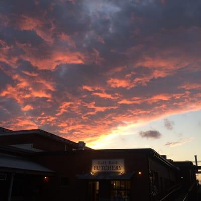 The Left Bank Butchery storefront at sunset. We're located on the corner between The Saxapahaw General Store and The Eddy Pub.