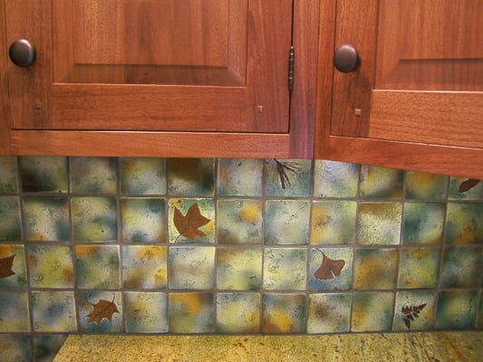 custom tile backsplash. We install too!