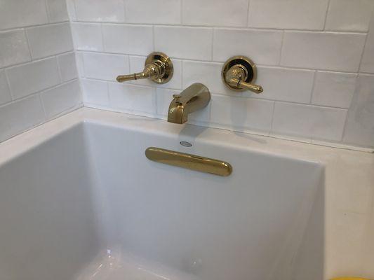 Installed two sinks and a bathtub.