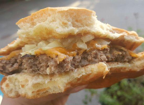 Bites into the Bombburger from Musangtino's at Fair Isle Brewing (6/22/21)