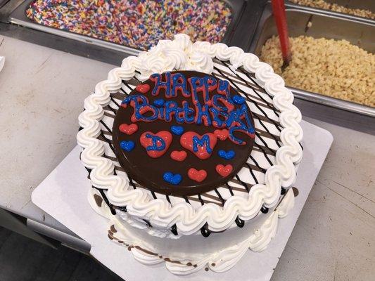 Nice happy birthday writing on a yummy ice cream cake by Sprinkles!!