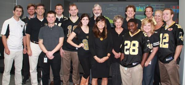 Bellwether staff ready for the Saints game on Monday Night Football.  Who Dat!