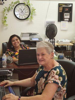 Our two staff members busy on a Wednesday morning always with a smile.