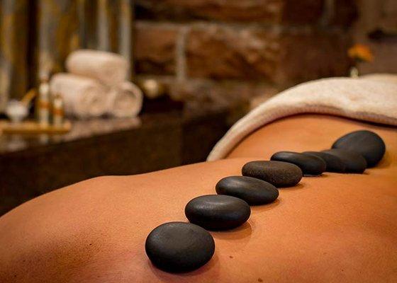 Relax and rejuvenate with hot stones to melt away muscle tension.