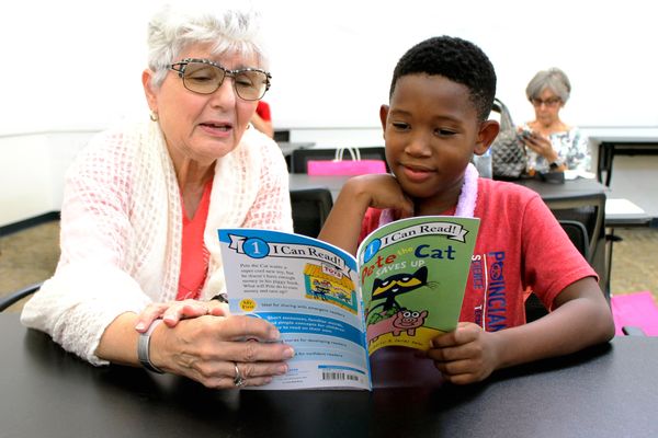 Building Better Readers volunteer tutor with student