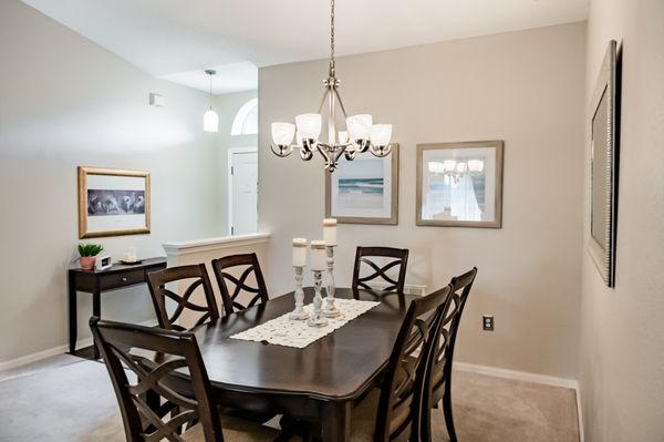 Cherry furniture nicely fills the dining area