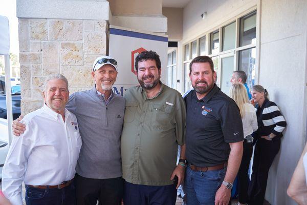 Jeffrey and Carey Meldon with guests at the Lake City Office Grand Opening Celebration