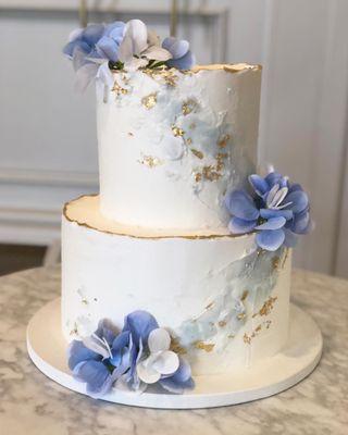 Water color buttercream and gold leaf