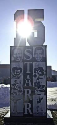 Statue honoring Packers legend Bart Starr, one of 24 statues located on the historic Walk of Legends, Green Bay,WI, USA.